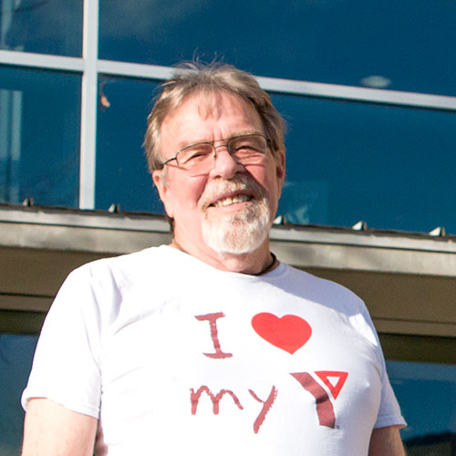 Bob smiling and wearing shirt that says I heart my Y